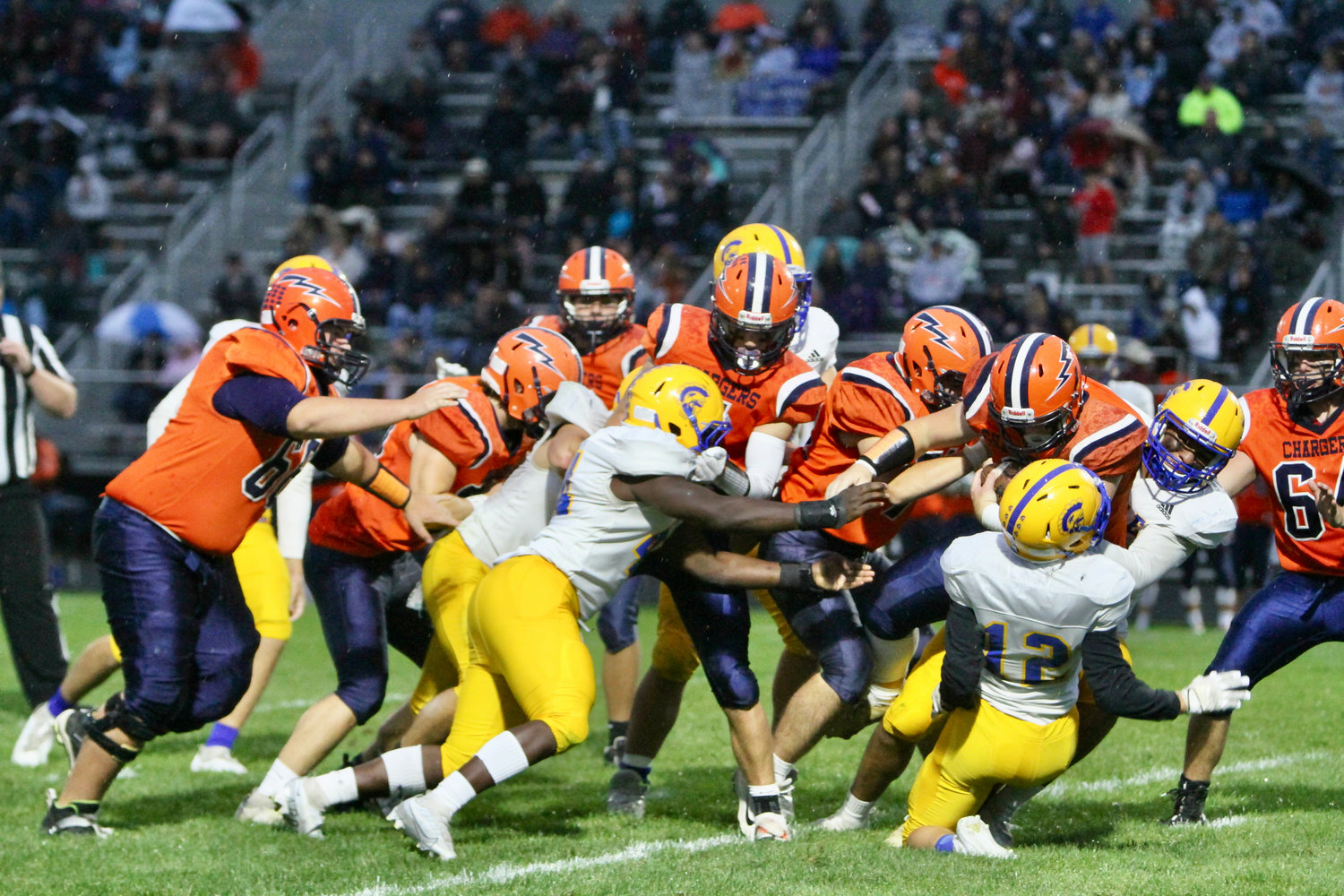 Crawfordsville's defense holds strong on rush by North Montgomery.